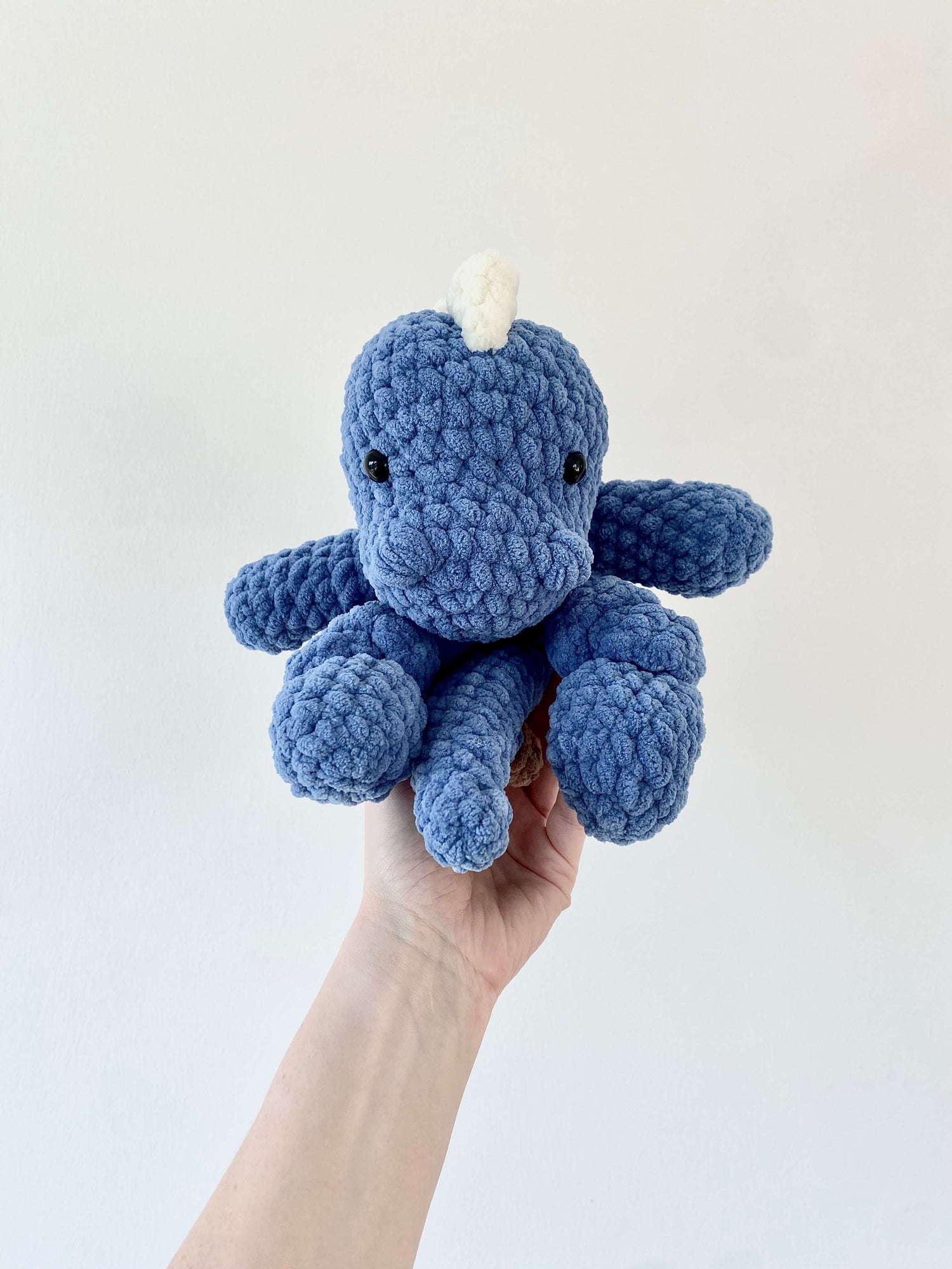 Folded Snuggler Dino Crochet Pattern Front view