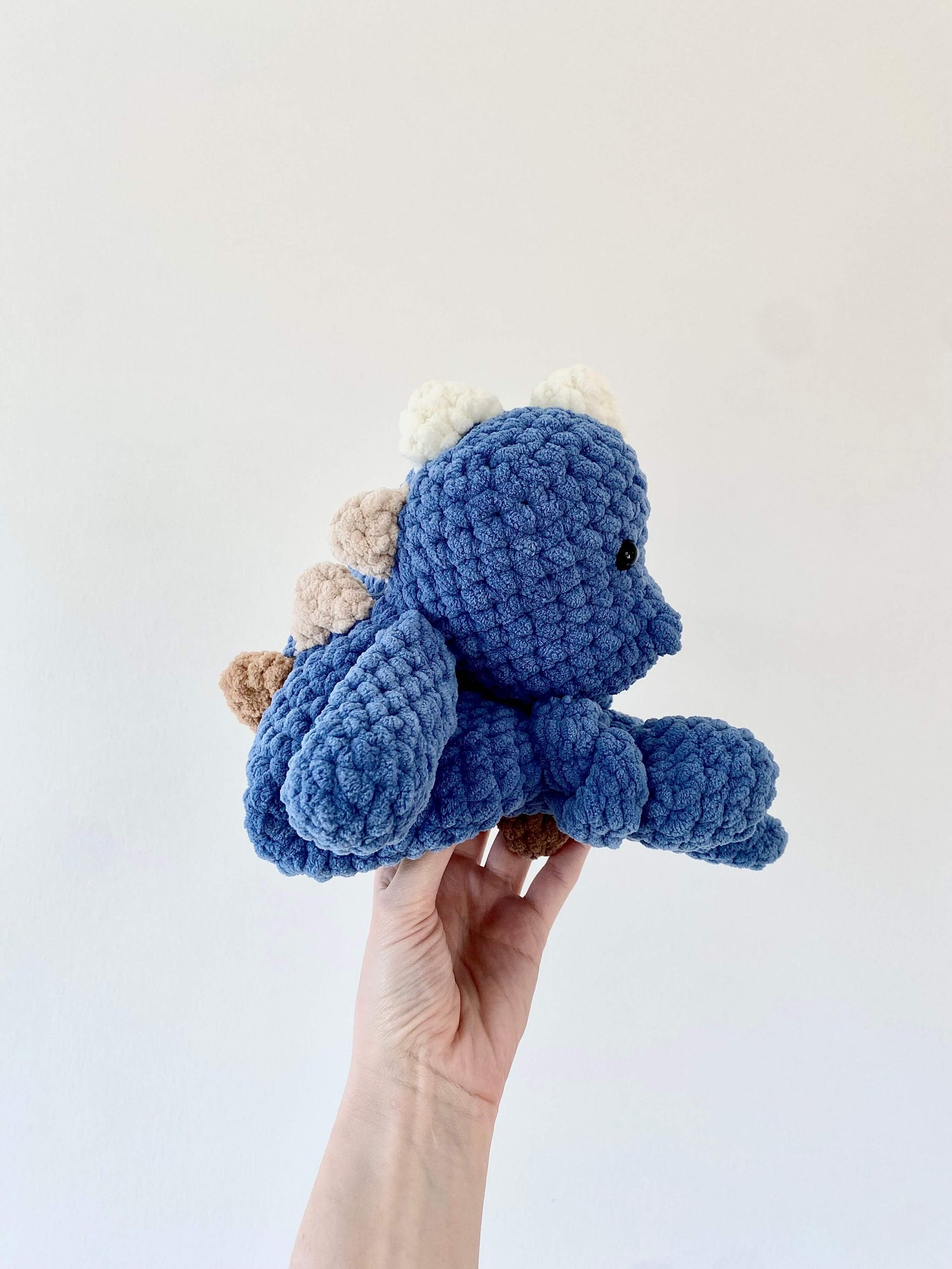 Sideview of T-Rex Snuggler, Knotted Lovey Crochet Pattern