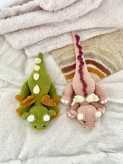 Size comparison of green and pink Dragon crochet pattern plushie amigurumi stuffed animal