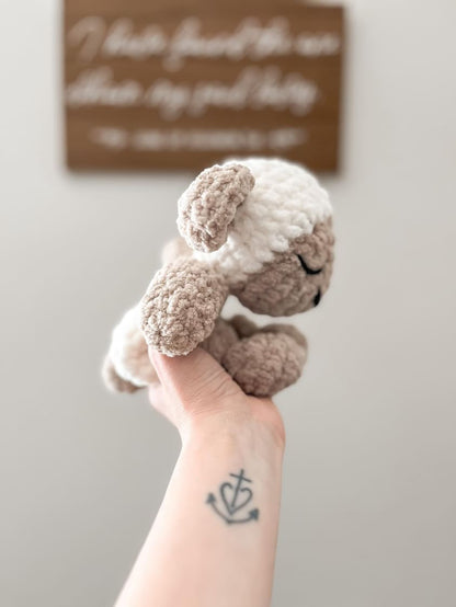 Lou the Lamb pattern includes step-by-step instructions to crochet the knotted lovey base, plushie body, and detailed head, suitable for all skill levels.